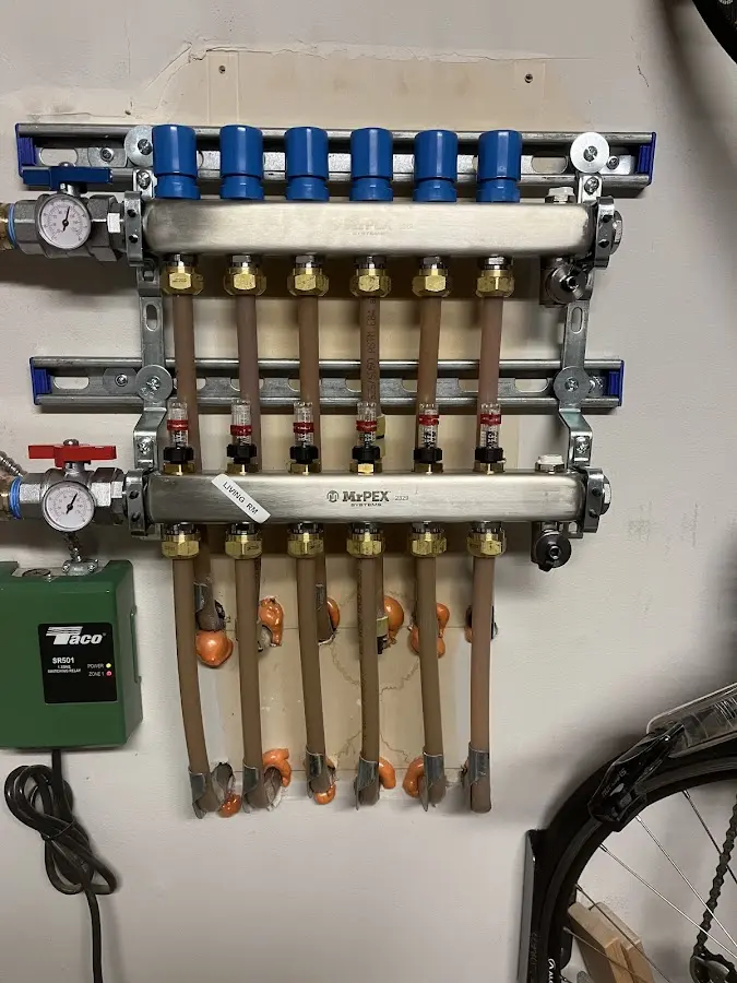 Plumber performing Water Heater Repair at a residential property in South Charleston